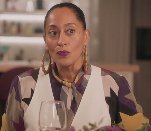 Rainbow's houndstooth tie neck blouse on Black-ish