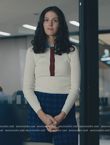 Rian's white colorblock sweater and pants on Billions