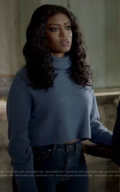 Ryan's blue cropped turtleneck sweater on Batwoman