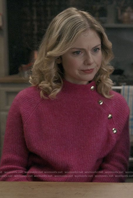 Sam's pink sweater with gold buttons on Ghosts
