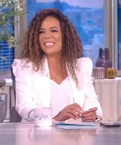 Sunny's white ruffled blazer on The View