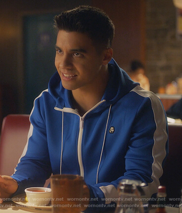 Vivek's blue stripe track jacket on Grown-ish