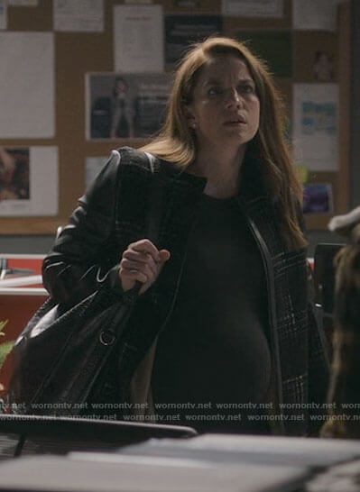 Vivian's black plaid coat with leather sleeves on Inventing Anna