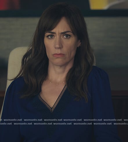 Wendy's blue embroidered trim v-neck blouse on Billions