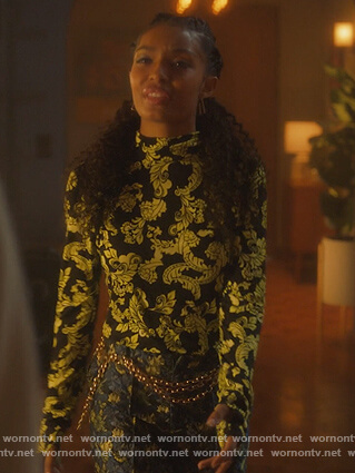 Zoey's black floral print turtleneck top on Grown-ish