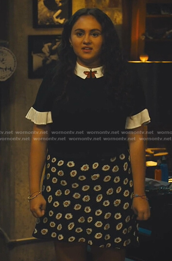 Annabelle’s black contrast pleated sleeve top and floral skirt on Naomi