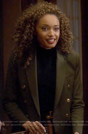 Astra's green blazer with gold buttons on Legends of Tomorrow