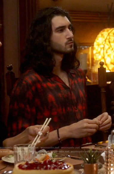 Behrad's red and black tie dye shirt on Legends of Tomorrow