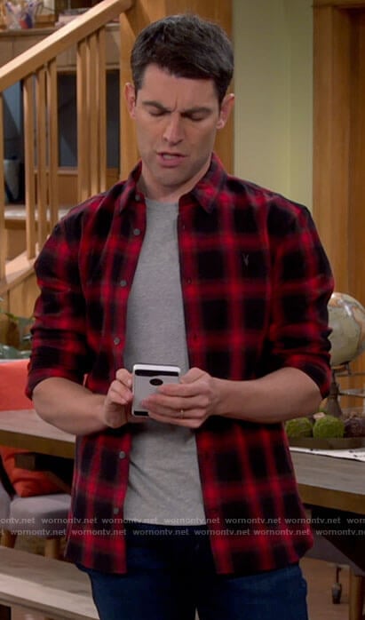 Dave's red and black plaid shirt on The Neighborhood