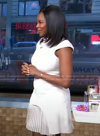 Dr. Michelle Henry's white pleated hem dress on Good Morning America