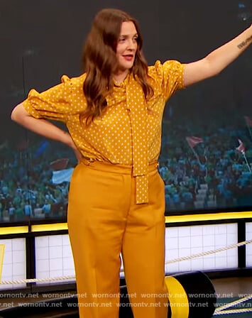 Drew's yellow polka dot print blouse on The Drew Barrymore Show