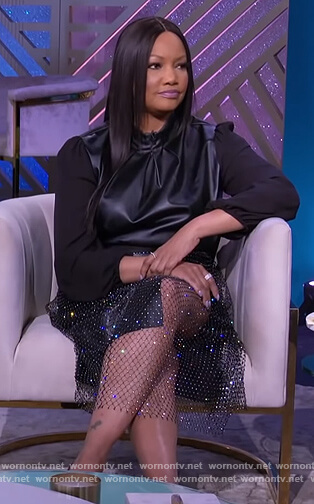 Garcelle's sparkle overlay skirt on The Real