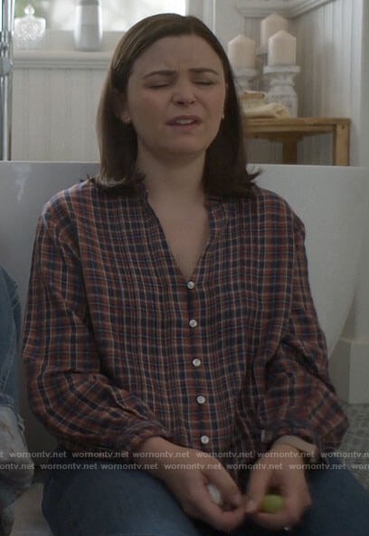 Jodie's plaid v-neck button front top on Pivoting