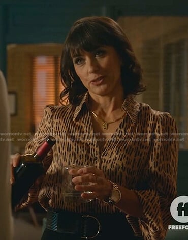 Kathleen's beige striped leopard blouse on Good Trouble