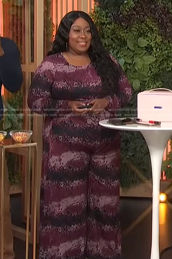 Loni's purple printed top and pants on E! News Daily Pop