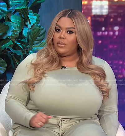 Nina's green drawstring jumpsuit on E! News Nightly Pop