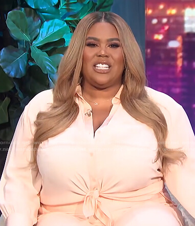 Nina's blush pink tie front blouse on E! News Nightly Pop
