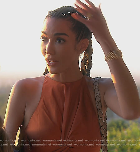 Noella's orange satin twisted dress on The Real Housewives of Orange County