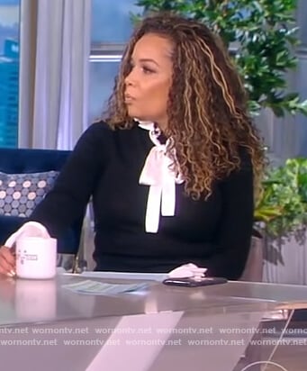 Sunny's chevron stripe skirt and contrast tie sweater on The View