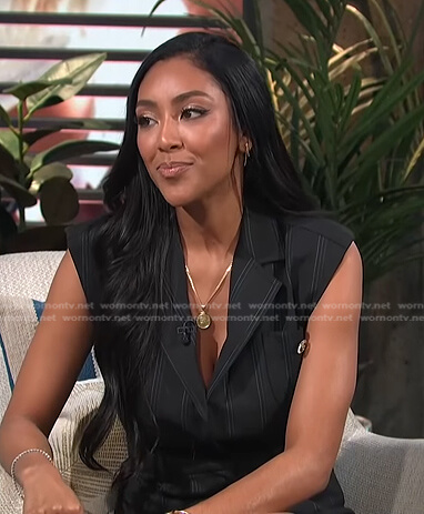 Tayshia’s black pinstripe sleeveless blazer dress on E! News Daily Pop