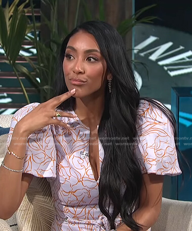 Tayshia's lilac floral puff sleeve dress on E! News Daily Pop