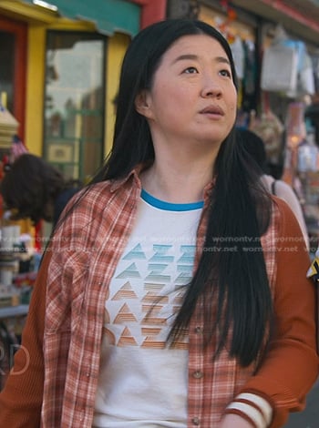 Alice's printed ringer tee and orange plaid jacket on Good Trouble