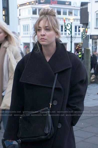 Cassie's black coat on The Flight Attendant