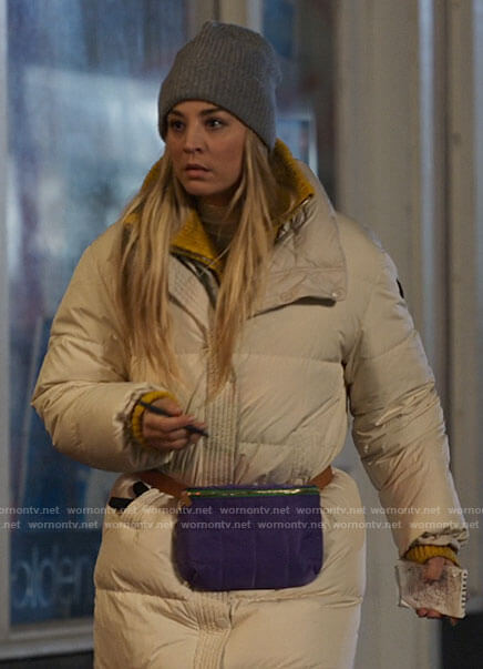 Cassie's white puffer jacket on The Flight Attendant