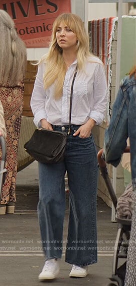 Cassie's white shirt and wide leg jeans on The Flight Attendant