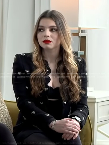 Daniella Pierson's black heart studded jacket and scalloped dress on Good Morning America