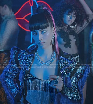 Rebe's studded embellished jacket and earrings on Elite