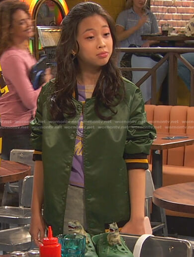 Ivy's green varsity bomber jacket on Ravens Home
