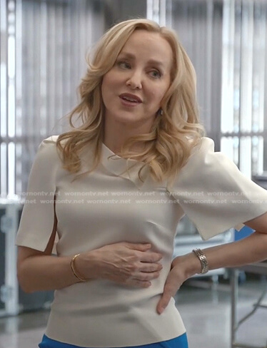 Marissa's white short sleeve top on Bull