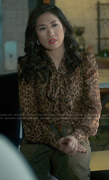 Mel's leopard print blouse and cargo pants on The Equalizer