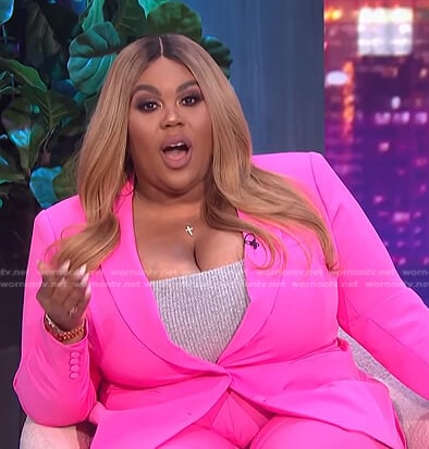 Nina's pink blazer and pants on E! News Nightly Pop