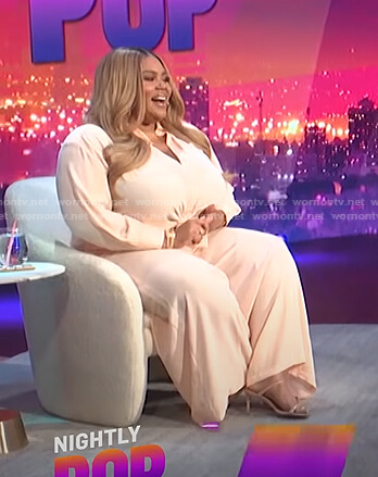 Nina's pink blouse and wide-leg pants on E! News Nightly Pop