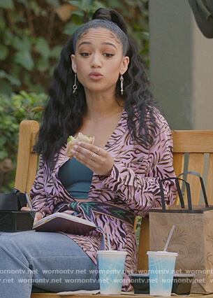 Olivia's pink tiger stripe shirt on All American