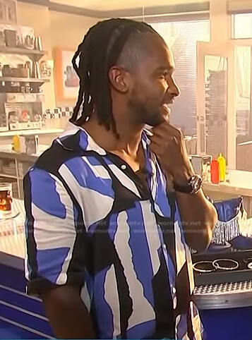 Scott's black and blue abstract print shirt on Access Hollywood