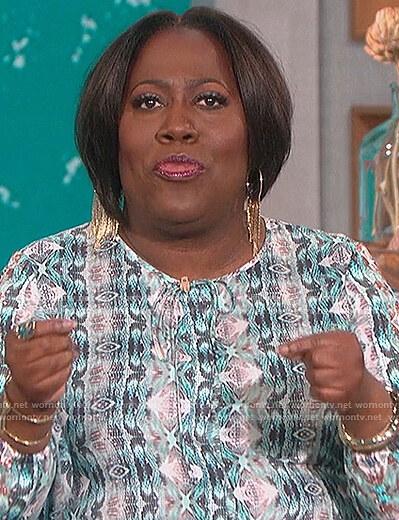 Sheryl's green snake print top on The Talk