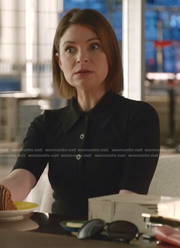 Taylor's black polo top on Bull