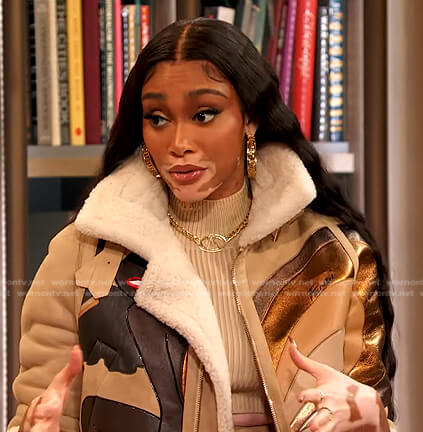 Winnie Harlow's beige leather bomber jacket on The Drew Barrymore Show