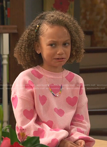 Alice's pink heart sweater and colorblock jeans on Ravens Home