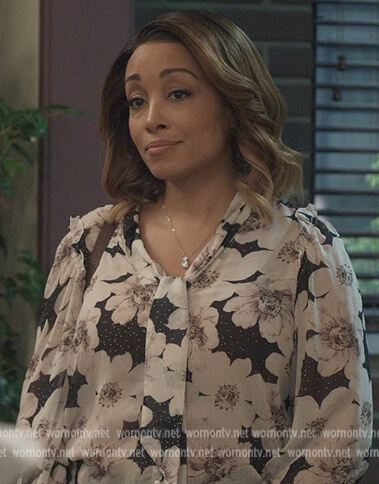 Tina Hick's floral blouse on All American Homecoming