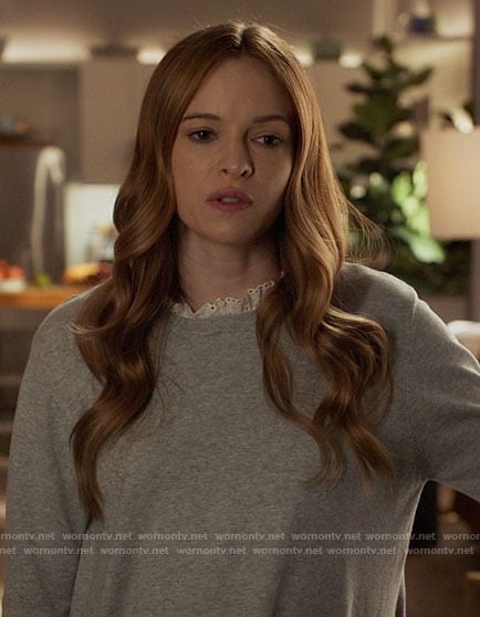 Caitlin's grey sweater with white ruffle neck on The Flash