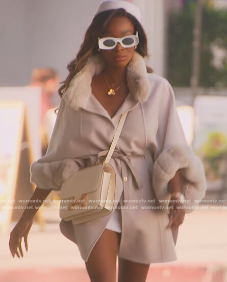 Chelsea's sunglasses and boots on Selling Sunset