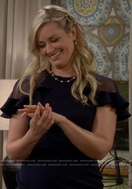 Gemma's navy dress with sheer shoulders on The Neighborhood