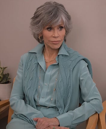 Grace's silk blouse and earrings on Grace and Frankie
