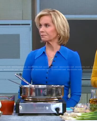 Joan Robach’s blue polo top on Good Morning America