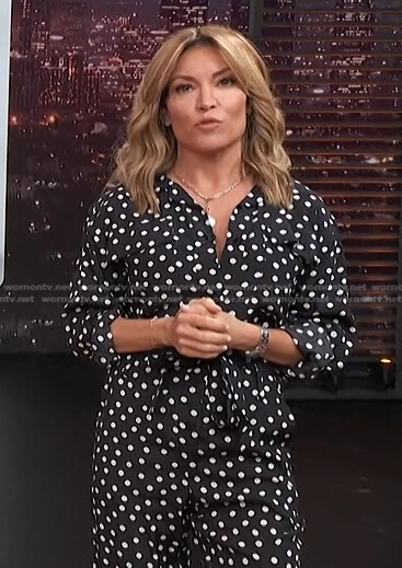 Kit's black polka dot jumpsuit on Access Hollywood