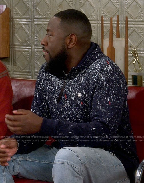 Malcolm's splatter print hoodie on The Neighborhood